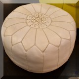 F21. Embroidered pouf. 